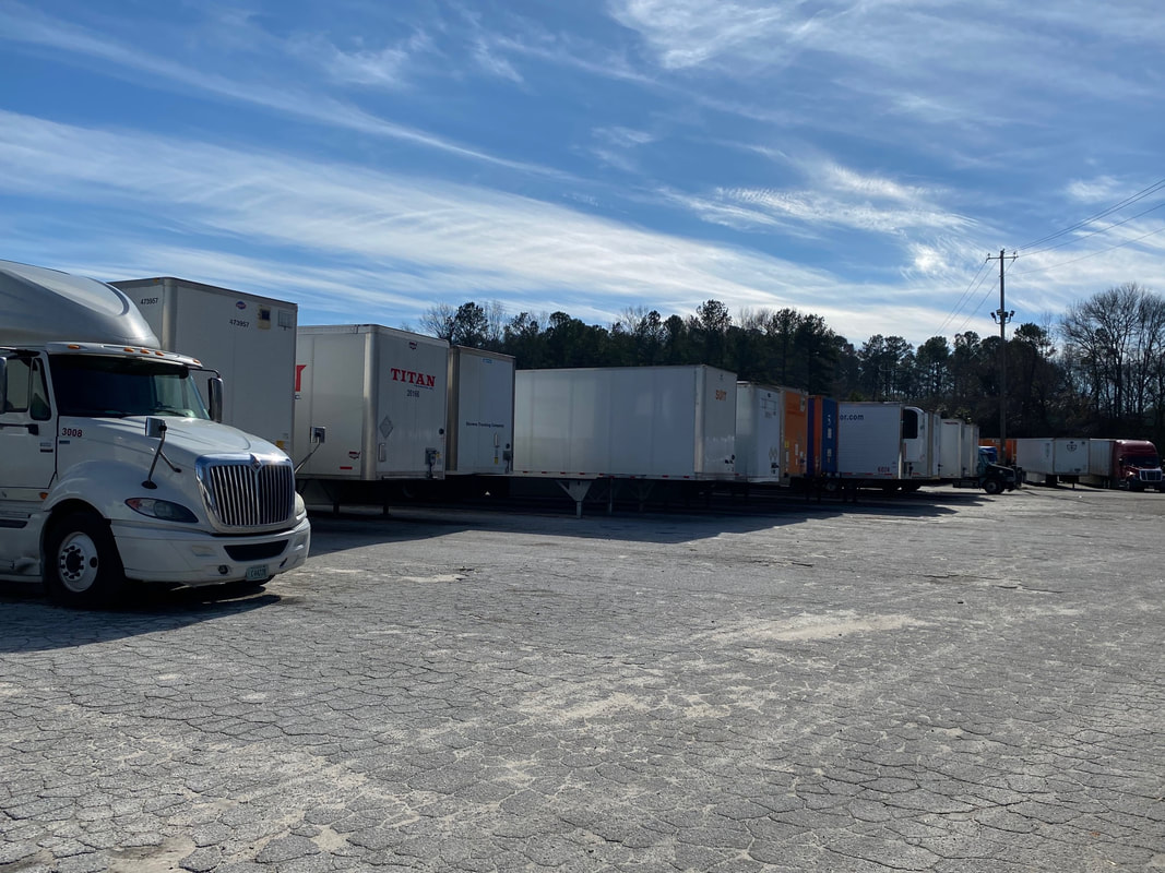 Gravel truck parking and trailer storage